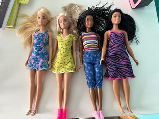 Barbie con cochecito y cachorros
