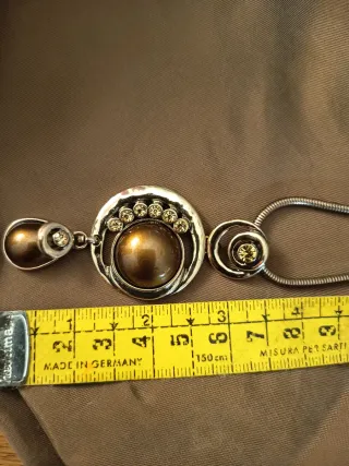 Colgante vintage cobre y circonitas.