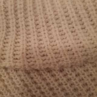 Jersey punto grueso cuello alto botones