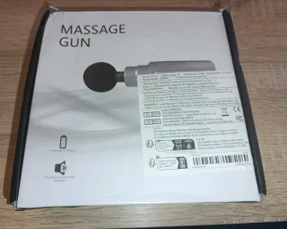 Pistola Masajeadora Portátil Negra y Dorada