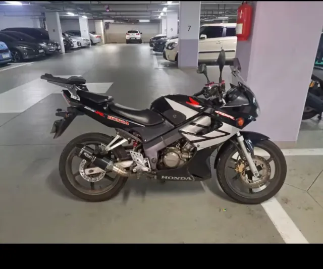 Escape Honda CBR 125