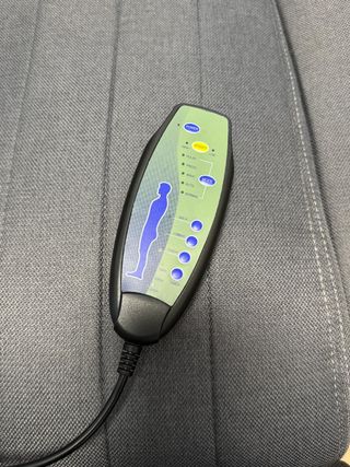 Silla oficina ergonómica masaje y reposapié