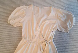 Vestido beige de lino con lazada