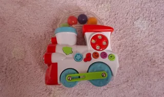 Tren de juguete musical con bolas