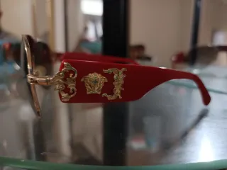 Occhiali da sole Versace dorati e rossi