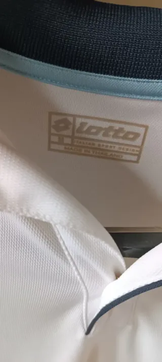 Polo Lotto blanco y azul