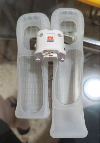 Nintendo Wii Bianca con Base di Carica e molto altro