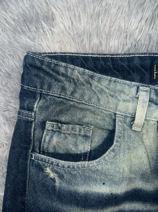 Jeans strappati effetto used