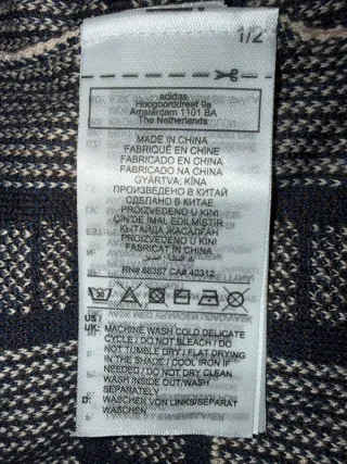 Adidas x Bran Dead knit polo.