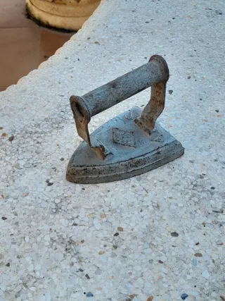 Plancha antigua de hierro