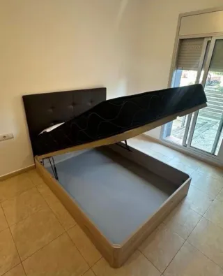 Canapé abatible con cabecero