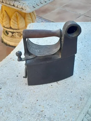 Plancha antigua de hierro