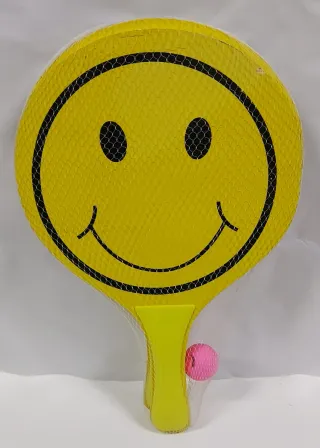 Raquetas de playa con cara sonriente y pelota