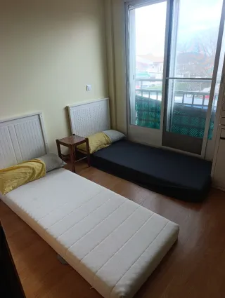 Cama nido de madera y metal