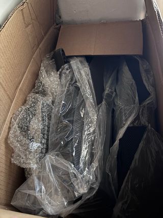 Silla de oficina negra, nueva en caja