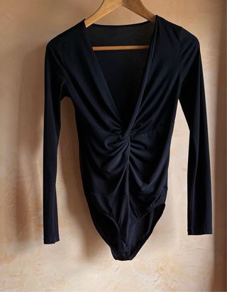 Body negro tejido suave adaptable