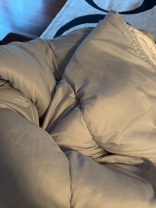 Piumone beige con stampa bianca