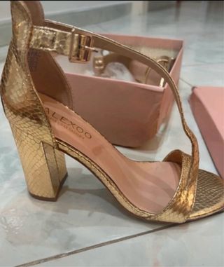 Tacchi oro effetto pitone