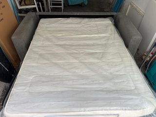 Sofá cama de tela gris