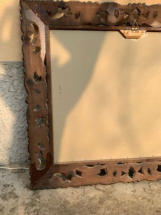 Specchio con cornice barocca dorata