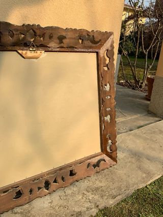 Specchio con cornice barocca dorata