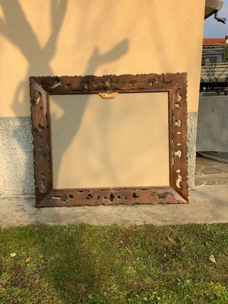 Specchio con cornice barocca dorata