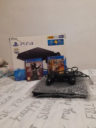 PS4 Slim 500GB + Mando y Juegos