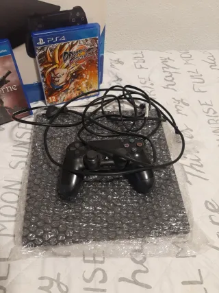 PS4 Slim 500GB + Mando y Juegos