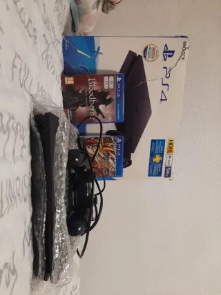 PS4 Slim 500GB + Mando y Juegos
