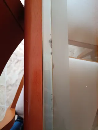 Mesa de comedor de madera y cristal extensible