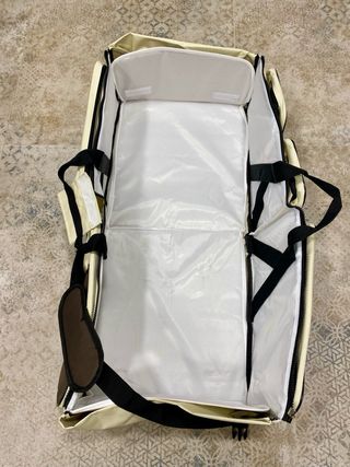 Mini cuna para bebé con bolsos