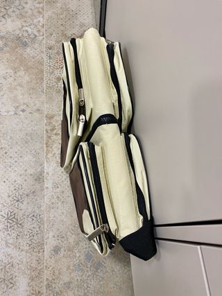 Mini cuna para bebé con bolsos