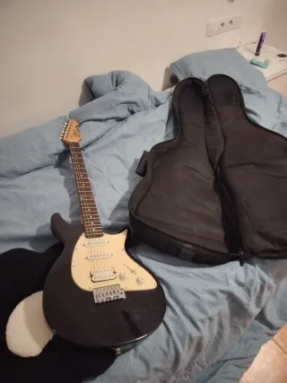 Guitarra Eléctrica Jim Harley + Amplificador