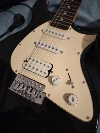 Guitarra Eléctrica Jim Harley + Amplificador