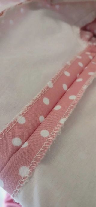 Vestido rosa lunares blancos