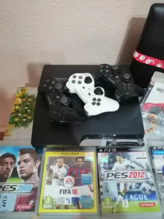 PlayStation 3 con juegos y mando
