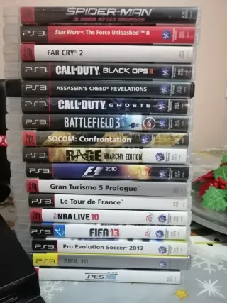 PlayStation 3 con juegos y mando