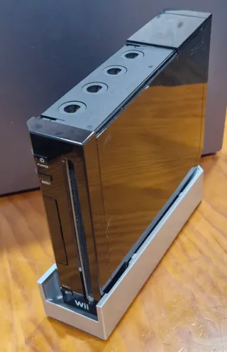 Console Nintendo Wii nera + accessori + 2 giochi