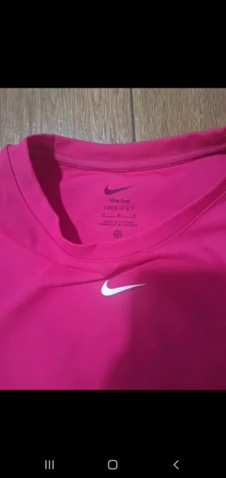 Conjunto deportivo Nike mujer fucsia