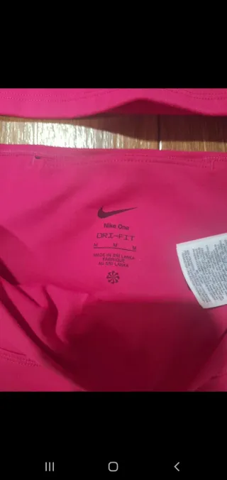 Conjunto deportivo Nike mujer fucsia