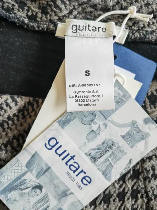 Pantalón de diseño elegante color kaki y negro