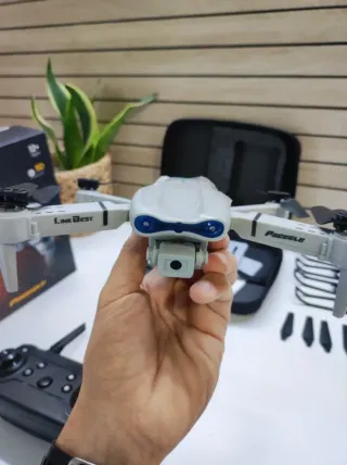 Dron con cámara blanco