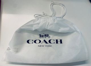 Bolsa guardapolvo Coach blanca