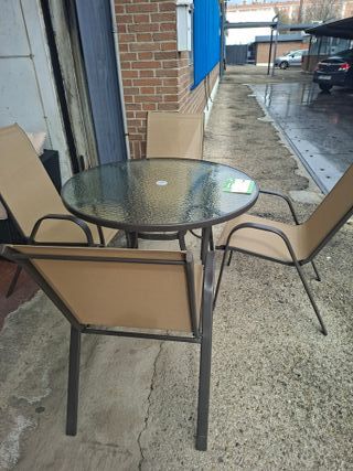 Mesa redonda cristal y 4 sillas terraza
