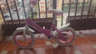Bicicleta niña rosa y blanca