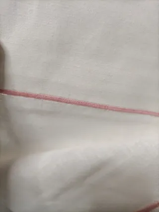 Sábana de lino metis francés con detalle rosa