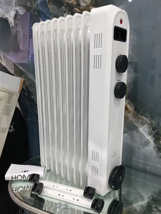 RADIADOR DE ACEITE DE 9 ELEMENTOS 2.000W 3NIVELES.