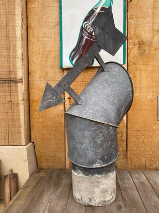 Veleta antigua de chimenea