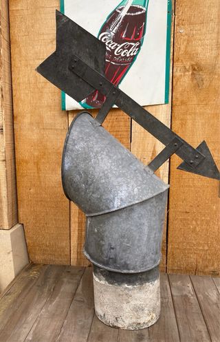 Veleta antigua de chimenea