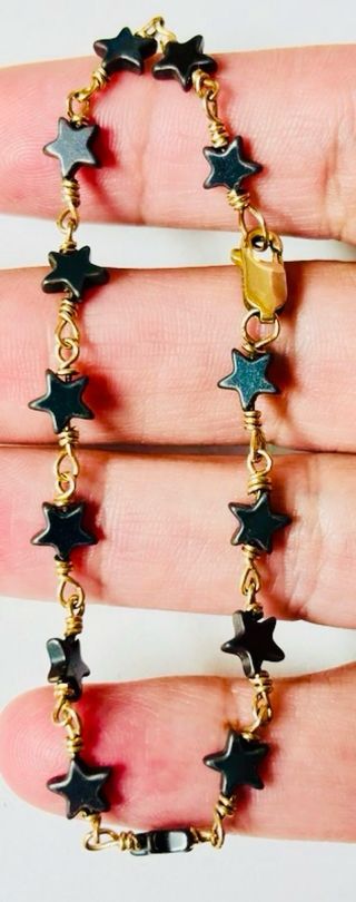 Pulsera estrellas de hematite en oro laminado 18KT